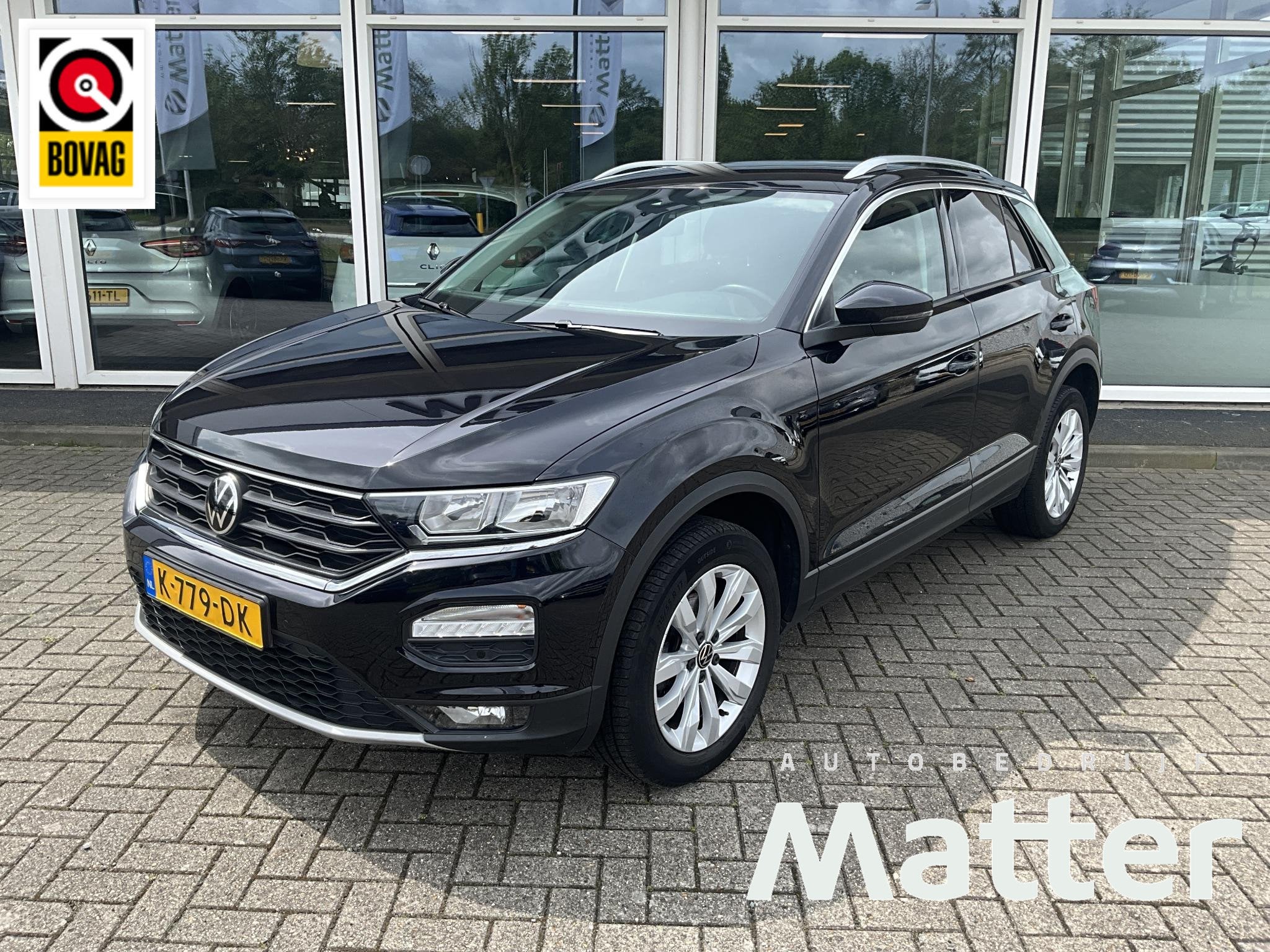 Volkswagen T-Roc 1.5 TSI Style Business, Auto's, 1254 kg, Stof, 4 cilinders, Zwart
