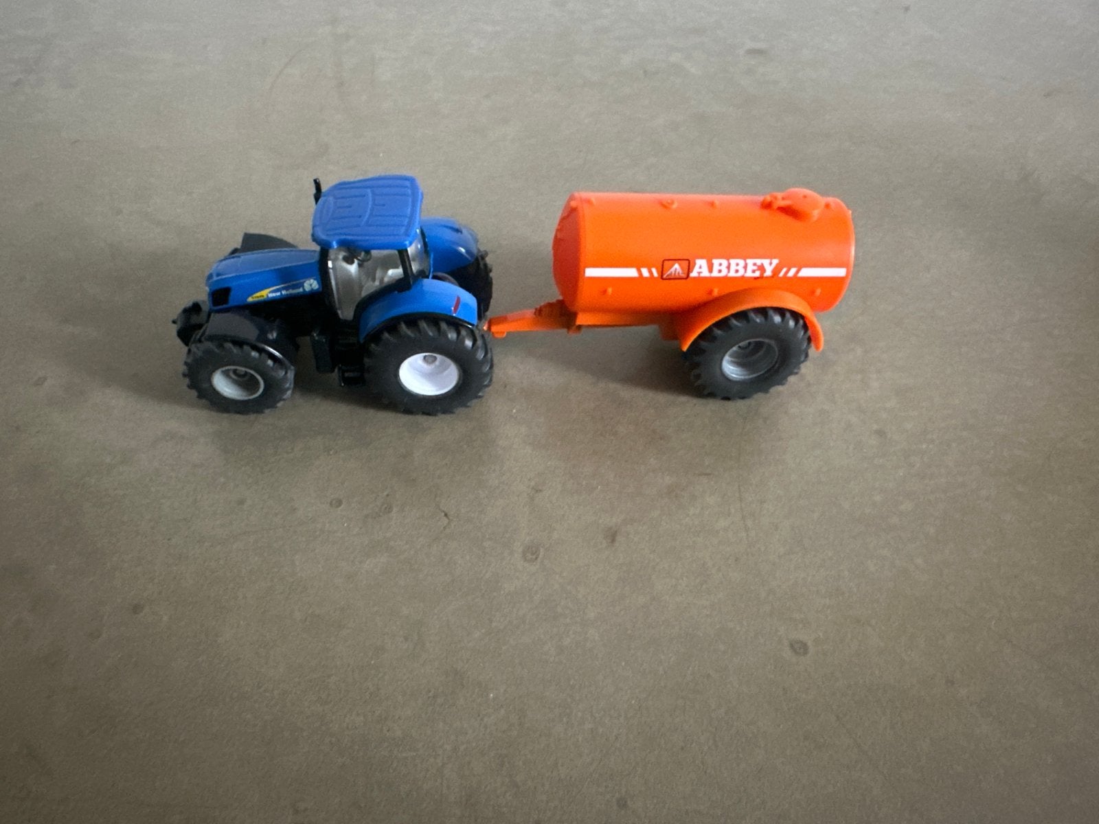 Siku New Holland Trekker met 1-assige mestwagen, Ophalen of Verzenden, Zo goed als nieuw