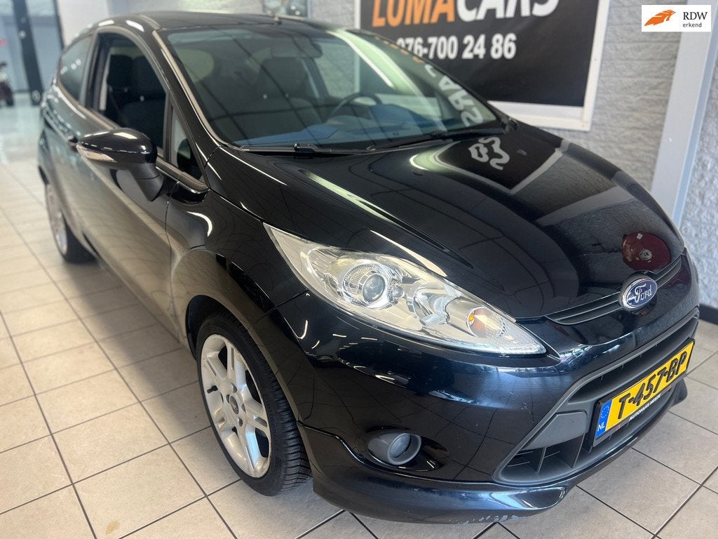 Ford Fiesta 1.4 Ghia, Auto's, Voorwielaandrijving, Euro 5, Gebruikt, 31 €/maand