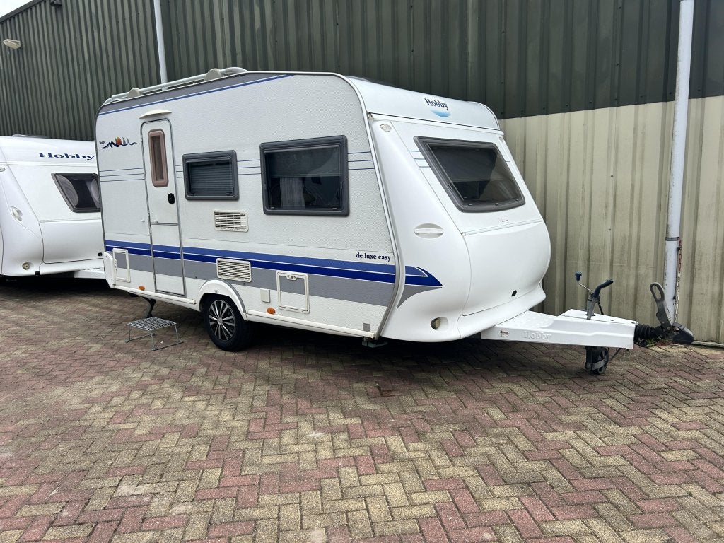 Hobby De luxe Easy 400 SF Vast bed Treinzit Tent, Caravans en Kamperen, Caravans, Hobby, Bedrijf, Treinzit, 750 - 1000 kg