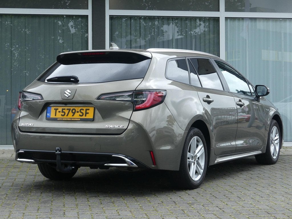 Suzuki Swace 1.8 Hybrid Style TREKHAAK Dealer o.h. Stuurverw, Auto's, Suzuki, Gebruikt, 4 cilinders, Origineel Nederlands, Hybride Elektrisch/Benzine