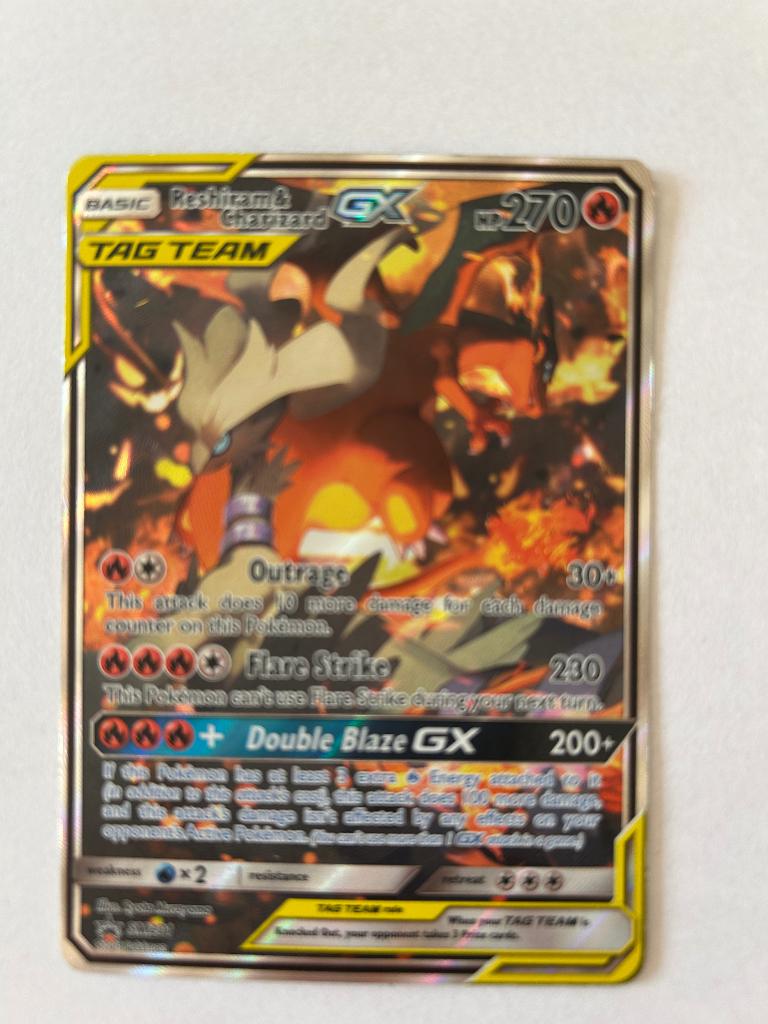 Pokemon Reshiram&Charizard full-art holo tag team SM201, Hobby en Vrije tijd, Ophalen, Zo goed als nieuw, Losse kaart, Foil