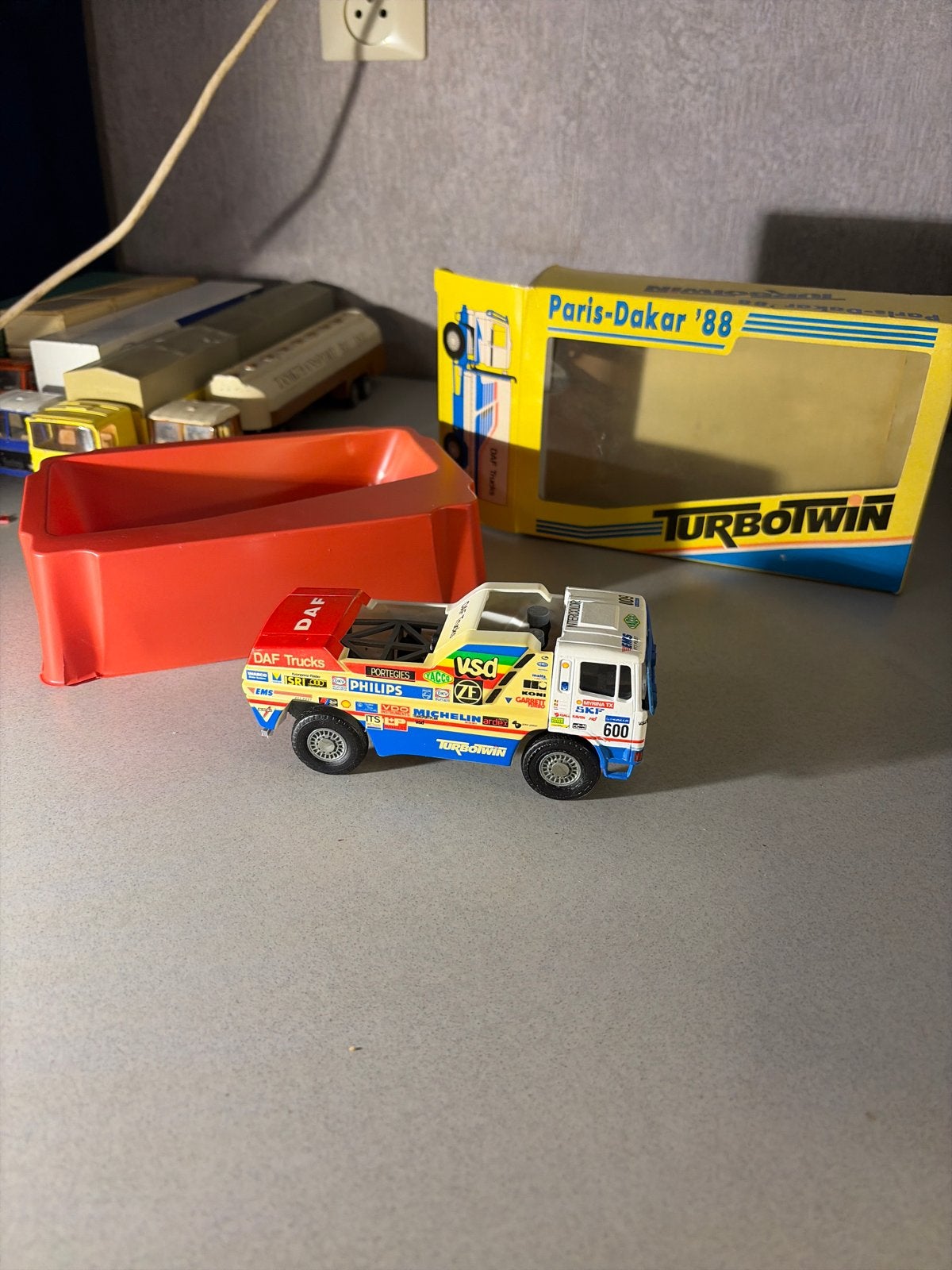 DAF TurboTwin Paris-Dakar '88 schaalmodel, Hobby en Vrije tijd, Ophalen of Verzenden, Gebruikt, Bus of Vrachtwagen, Lion Toys