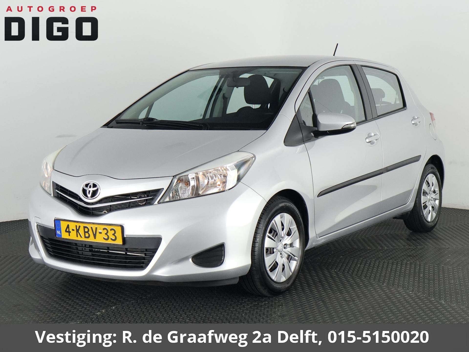 Toyota Yaris 1.3 VVT-i Aspiration | Navigatie | Cruise Contr, Auto's, Stof, Zwart, 4 cilinders, Bedrijf