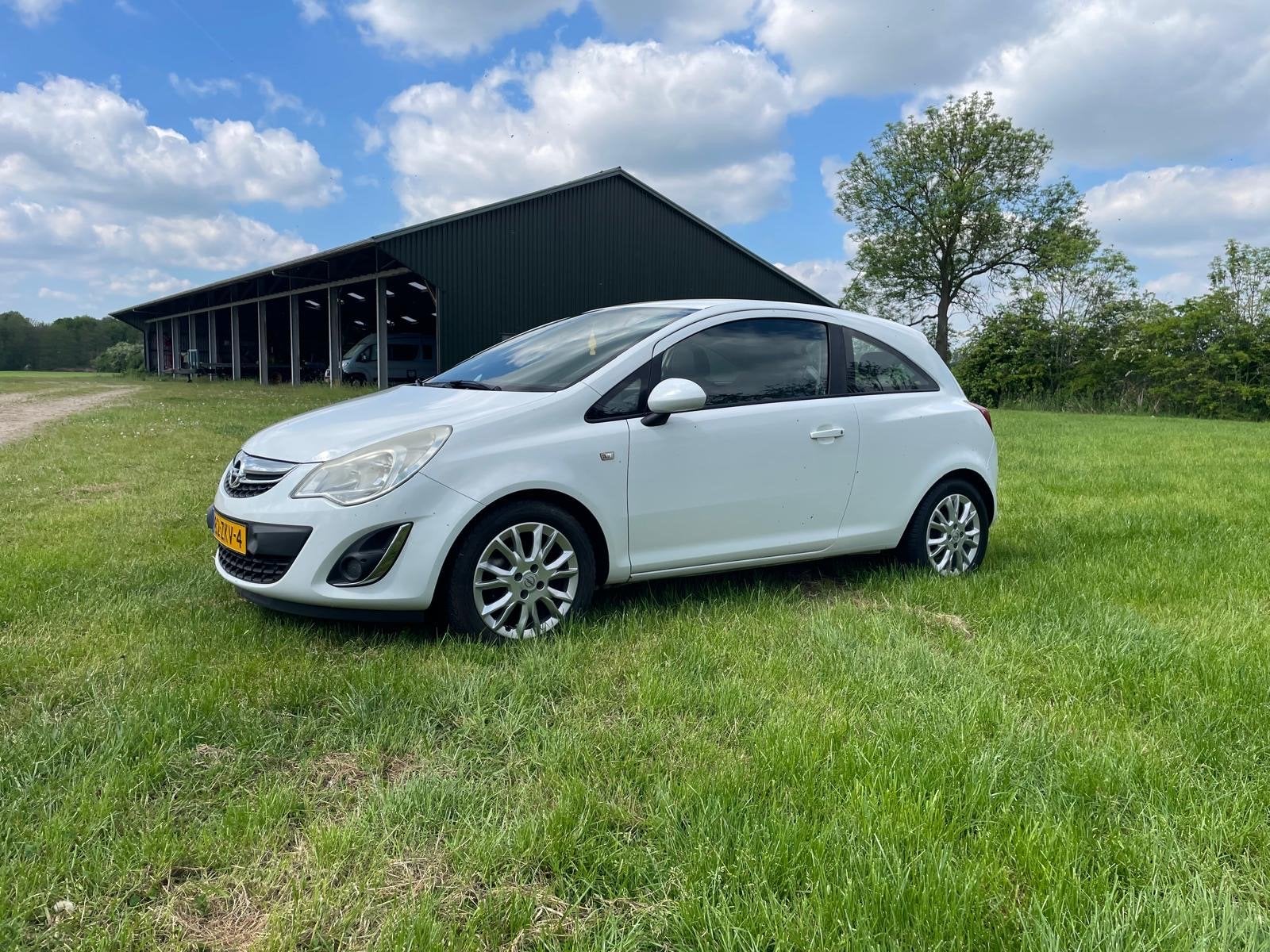 Opel Corsa 1.2 16V LPG 3D 2012 Wit, Auto's, Opel, Voorwielaandrijving, 83 pk, 4 cilinders, 1229 cc