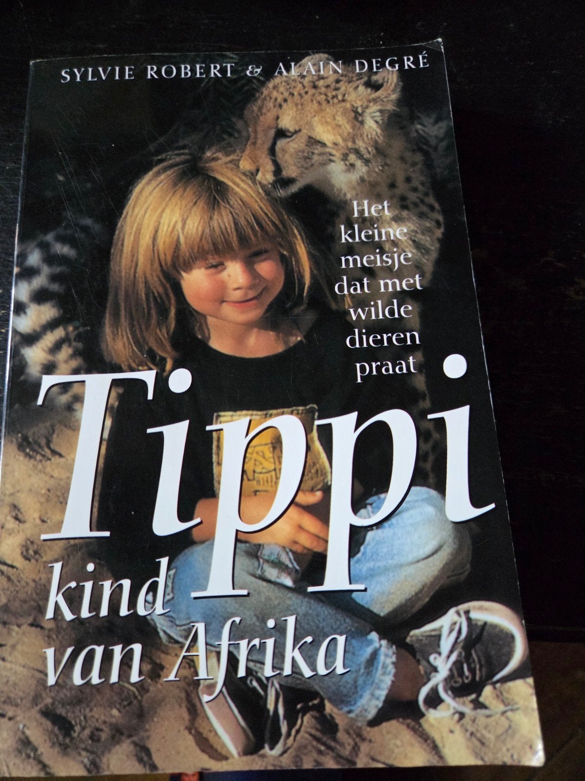 Tippi kind van Afrika, Boeken, Ophalen of Verzenden, Zo goed als nieuw