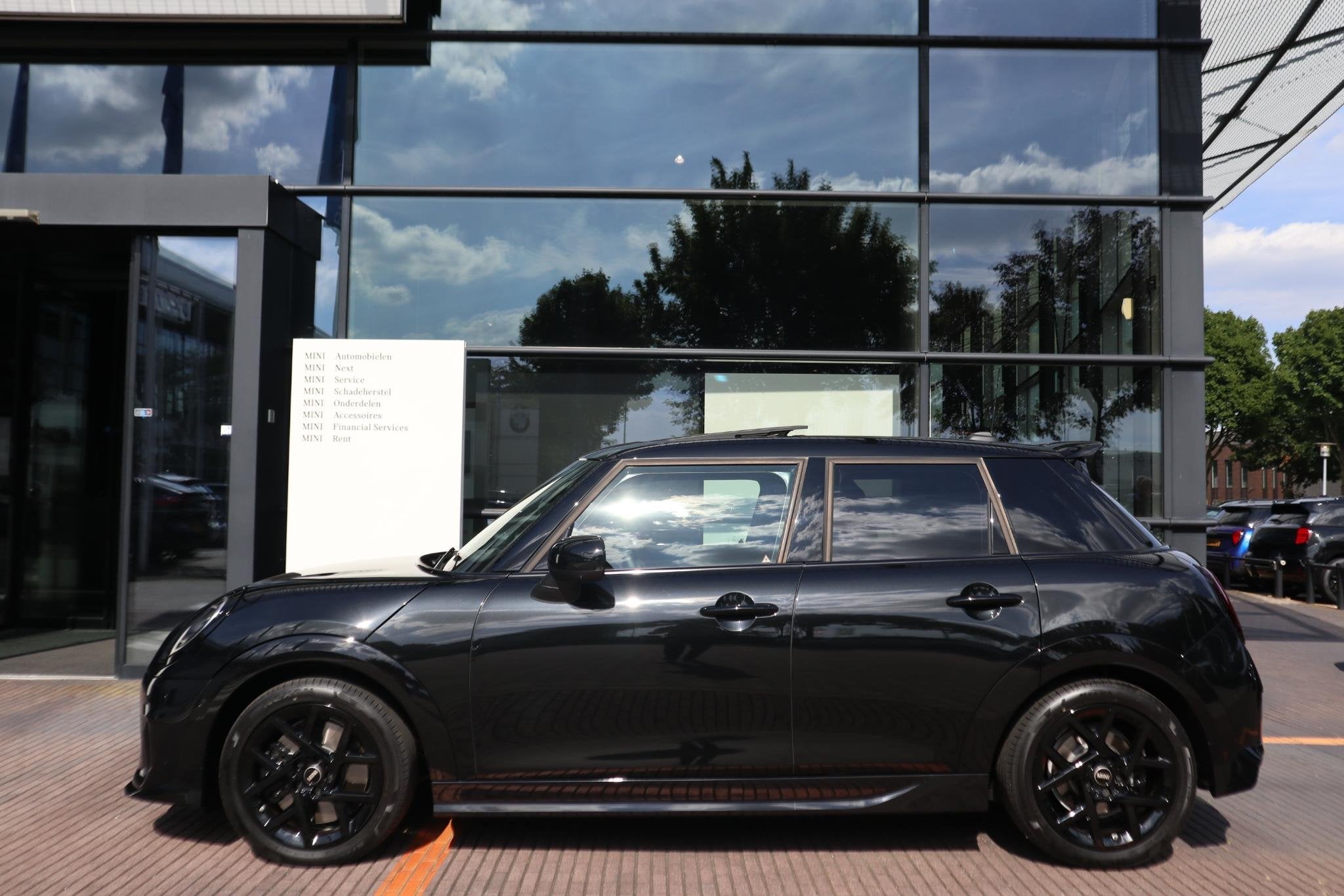 MINI 5-Deurs Cooper C | John Cooper Works uitvoering + Pakke, Gebruikt, 156 pk, Met garantie (alle), Leder en Stof