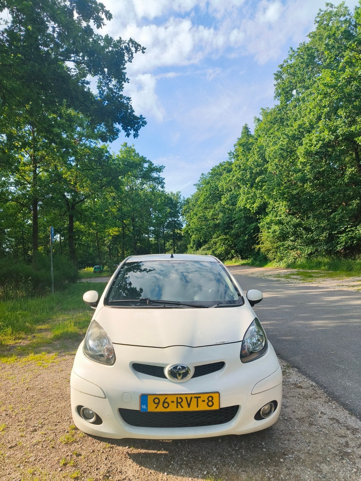 Toyota Aygo 1.0 12V Vvt-i 5DRS 2011 Wit, Auto's, Toyota, Voorwielaandrijving, Stof, Zwart, 4 stoelen