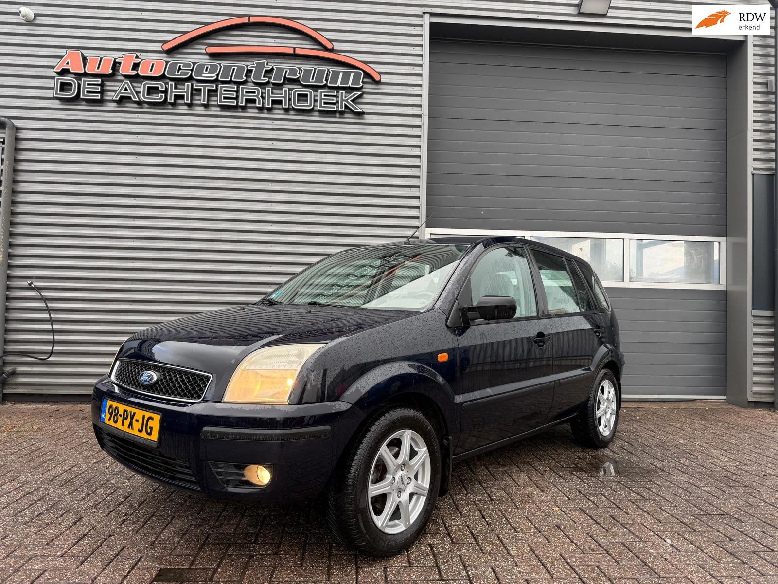 Ford Fusion 1.4-16V Ghia, Auto's, Voorwielaandrijving, Blauw, Origineel Nederlands, Bedrijf