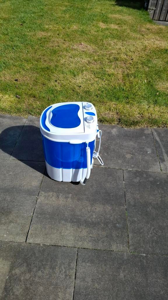 Adler mini wasmachine, Ophalen