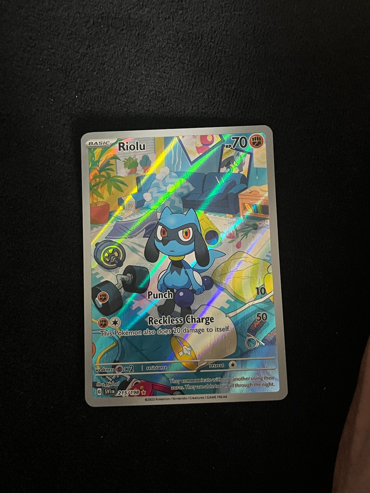 Riolu SV Base 215/198 NM Pokémon kaart, Ophalen of Verzenden, Zo goed als nieuw, Losse kaart, Foil