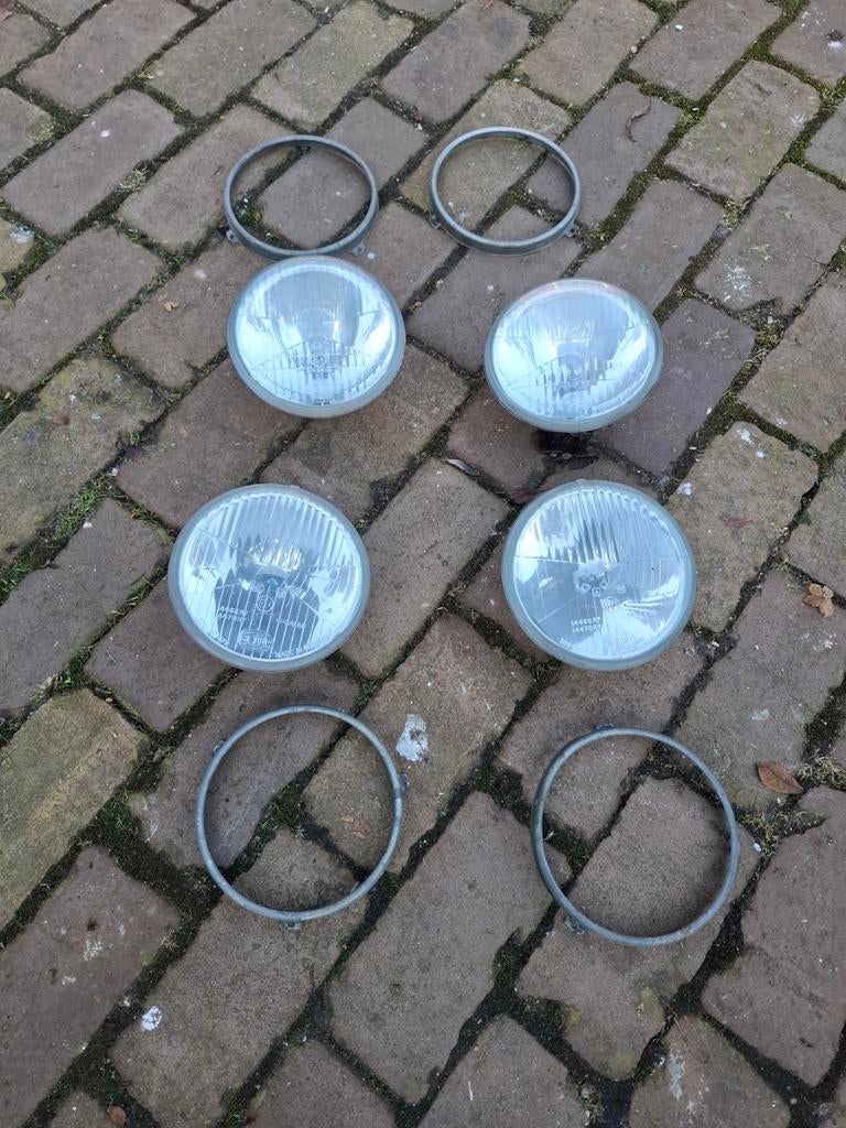 Hella koplampen set (4 stuks) met ringen, Ophalen of Verzenden, Gebruikt, Universele onderdelen