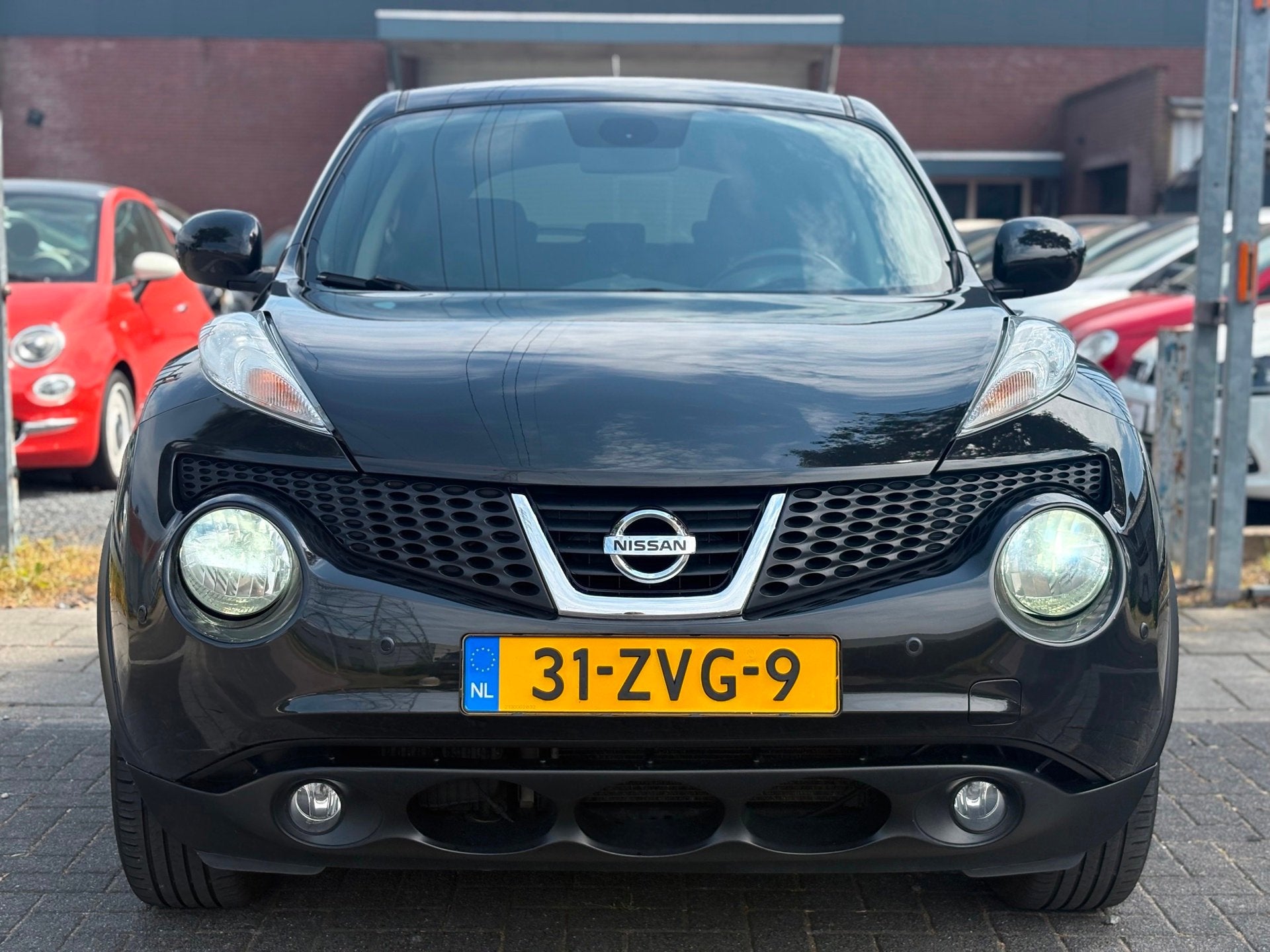 Nissan Juke 1.6 DIG-T Acenta 190 PK | Navigatie | A.Camera |, Auto's, Voorwielaandrijving, Euro 5, Gebruikt, Zwart