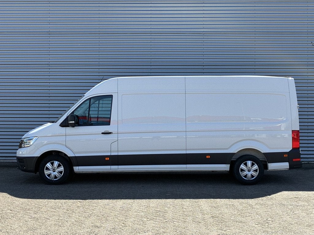 MAN TGE 35 2.0 3.180 L4H3 180PK NIEUW! LED Cruise Airco CarP, Voorwielaandrijving, Stof, Gebruikt, Wit