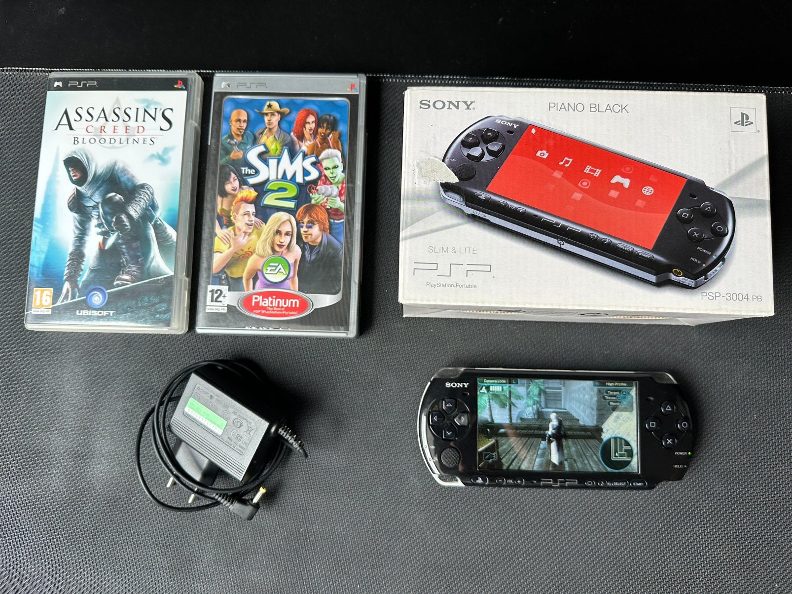 Sony psp 3004 compleet met games., Spelcomputers en Games, Spelcomputers | Sony PSP, Zo goed als nieuw, PSP, Met games, Ophalen of Verzenden