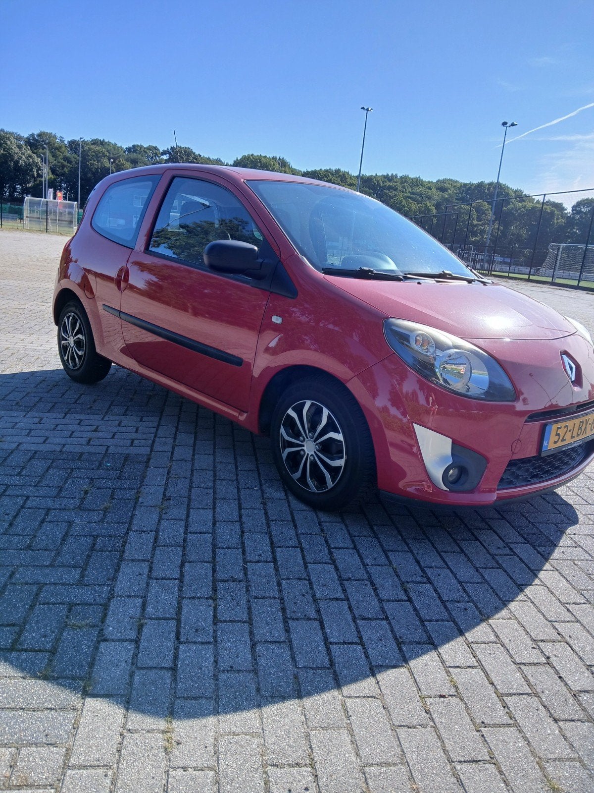 Renault Twingo 1.2 16V 2010 Rood, Auto's, 839 kg, Twingo, 4 cilinders, 4 stoelen