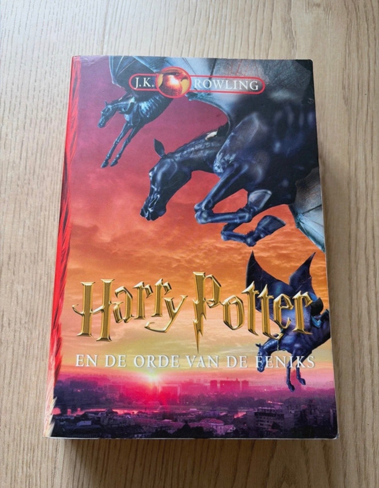 Harry Potter en de Orde van de Feniks - J.K. Rowling, Ophalen of Verzenden, Gelezen, Nederland