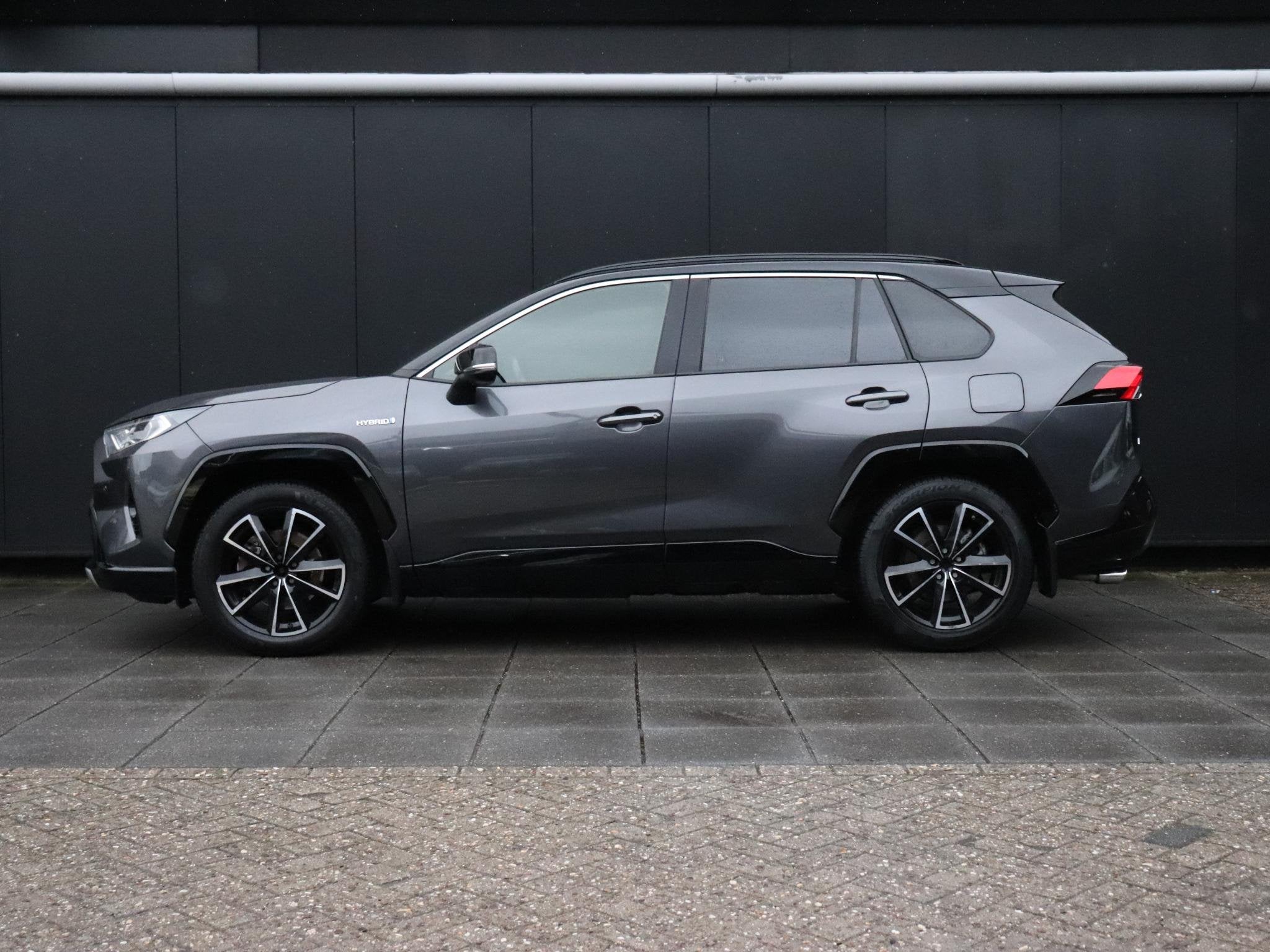 Toyota RAV4 2.5 Hybrid Bi-Tone | LEDER | PANO-DAK | TREKHAAK, Stof, Gebruikt, 4 cilinders, 2487 cc