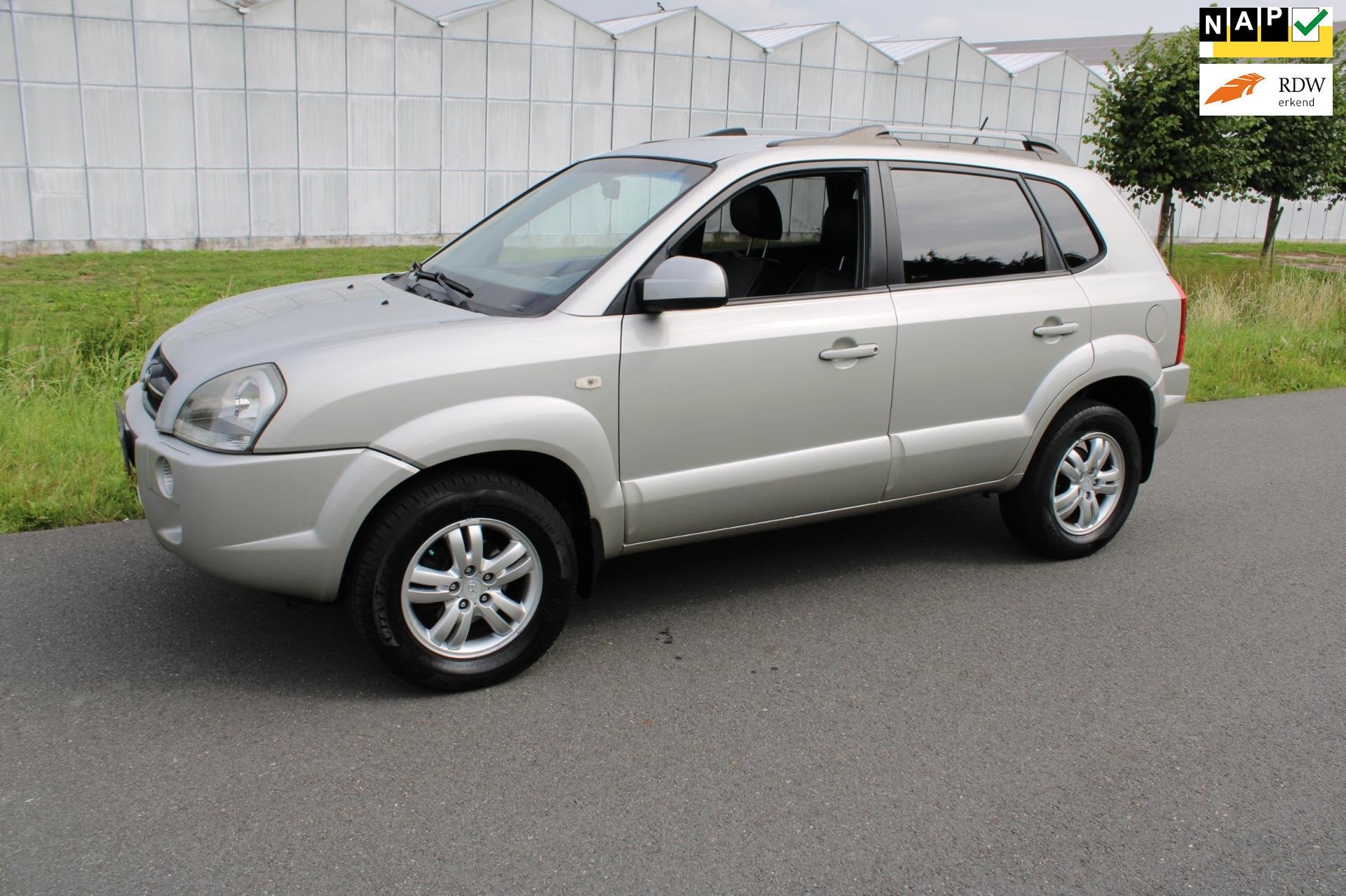 Hyundai Tucson 2.0i Style Supreme met Leder en Climate contr, Auto's, Dealer onderhouden, 4 cilinders, Handgeschakeld, Tucson