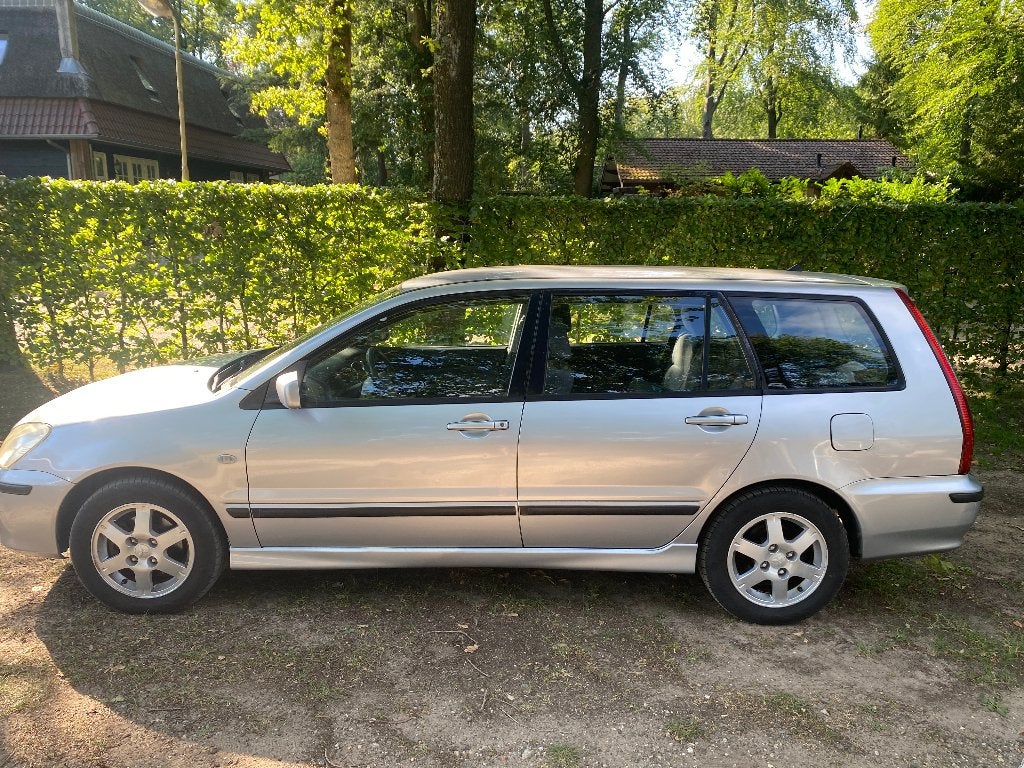 Mitsubishi Lancer Wagon 1.6 Sport park hulp CV zilv handfree, Auto's, Mitsubishi, Voorwielaandrijving, 400 kg, Handgeschakeld
