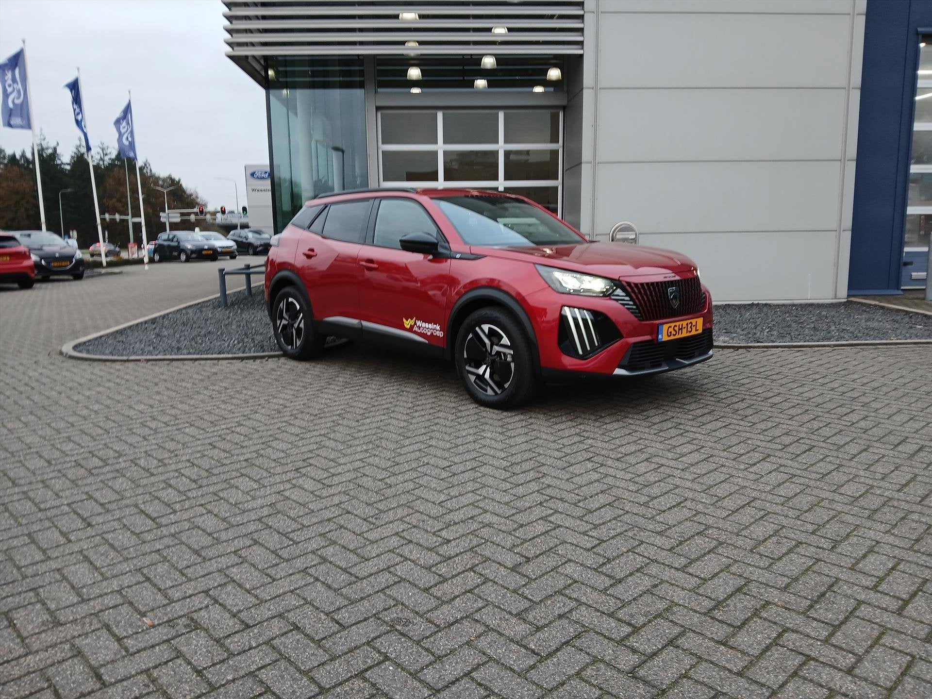 Peugeot e-2008 EV 54kWh I DEMO DEAL I 156pk Allure I Pack Dr, Auto's, Stof, Zwart, 156 pk, Origineel Nederlands