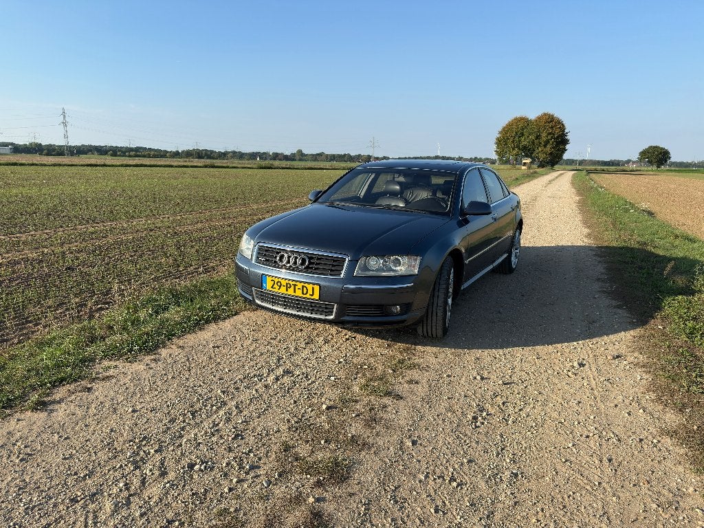 Audi A8 4.2 Quattro 246KW AUT 2003 Grijs, Auto's, Automaat, 4172 cc, Blauw, Xenon verlichting
