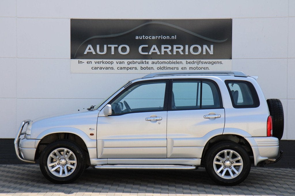 Suzuki Grand Vitara 2.0 FreeStyle-3 4WD Airco Trekhaak NAP !, Auto's, Suzuki, Automatische klimaatregeling, 1330 kg, Zwart, 4 cilinders