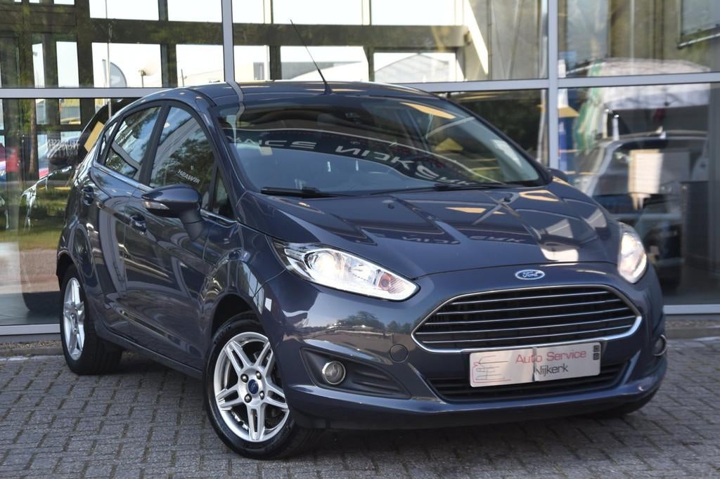 Ford Fiesta 1.0 EcoBoost Titanium Airco Nav. Pdc Lm-Velgen 1, Auto's, Ford, Voorwielaandrijving, Euro 5, Zwart, 23 km/l