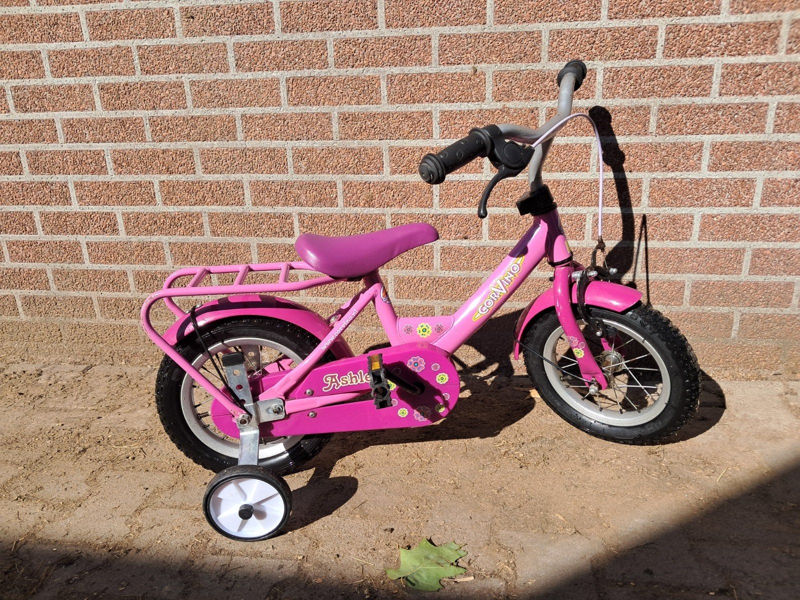 Roze kinderfiets met zijwieltjes - Corvino 12 inch, Ophalen, Terugtraprem, Zijwieltjes, Gebruikt