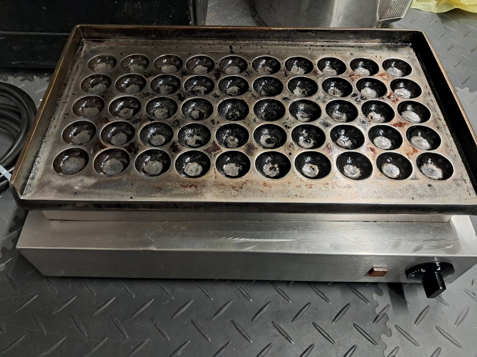 neumarker poffertjesplaat 50 dops, Ophalen