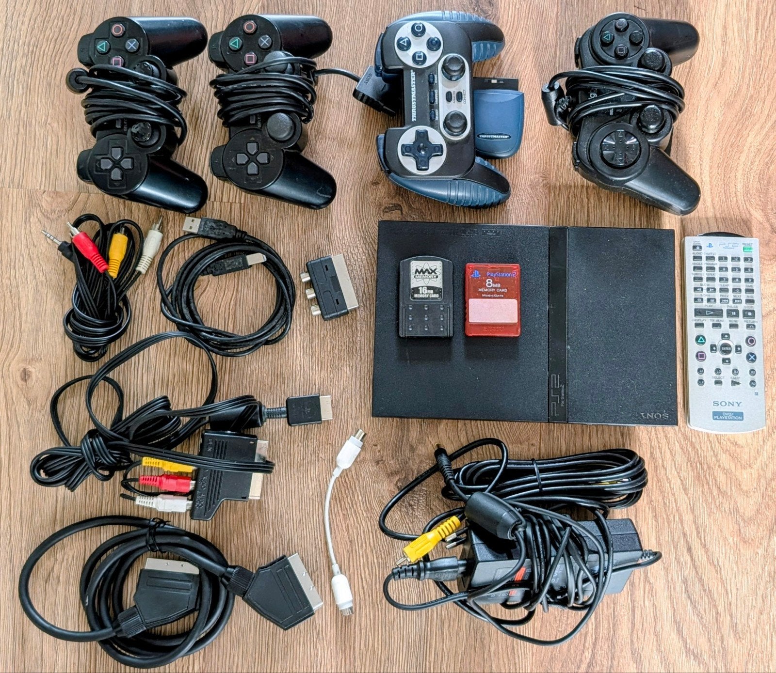 PlayStation 2 Slim met 4 controllers en 20+ games, Ophalen, Gebruikt, Zwart, Met games