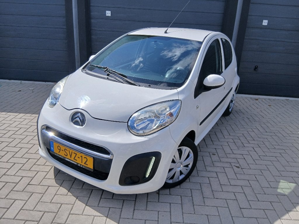 Citroën C1 1.0i 68PK 5D 2014 Wit, Auto's, Voorwielaandrijving, Euro 5, Stof, 4 stoelen