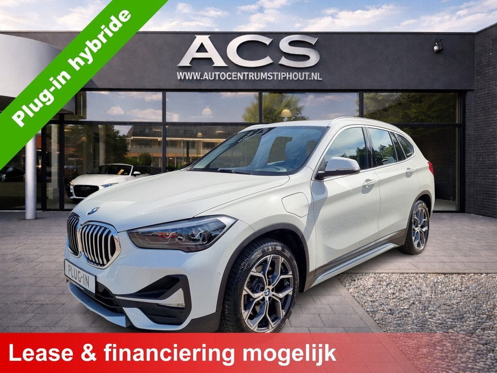 BMW X1 xDrive25e X Line | Panorama | Leder | Widescreen | Ze, Gebruikt, Leder en Stof, Wit, Bedrijf