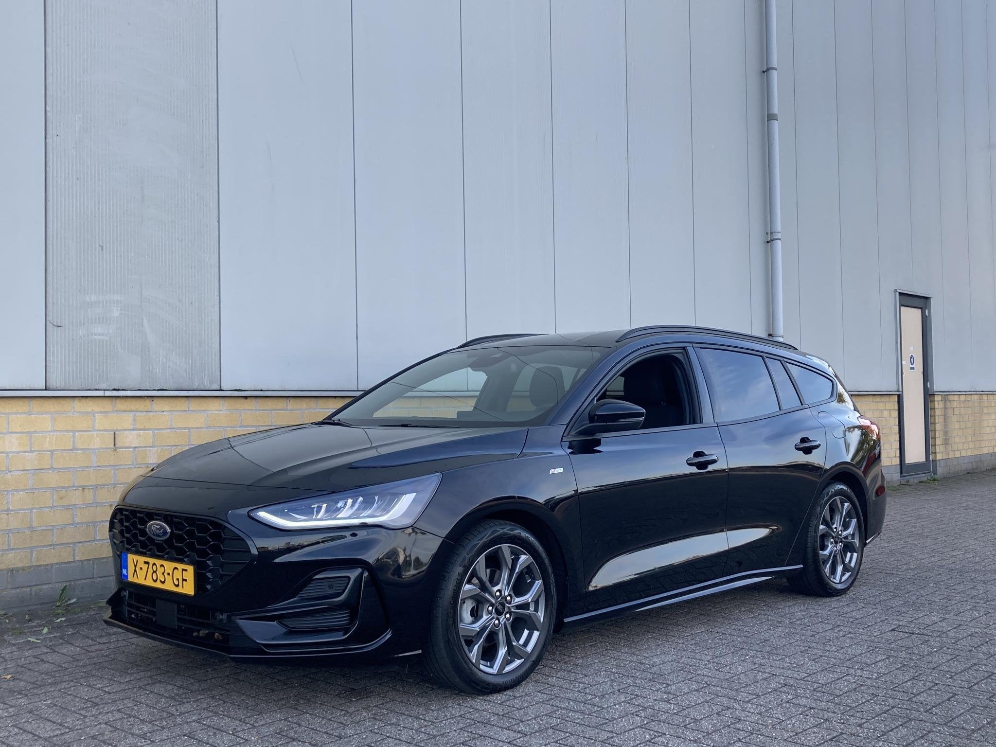 Ford Focus 1.0 EcoBoost Hybrid ST Line 125 pk Wagon GROOT NA, Auto's, Gebruikt, Zwart, Origineel Nederlands, Handgeschakeld