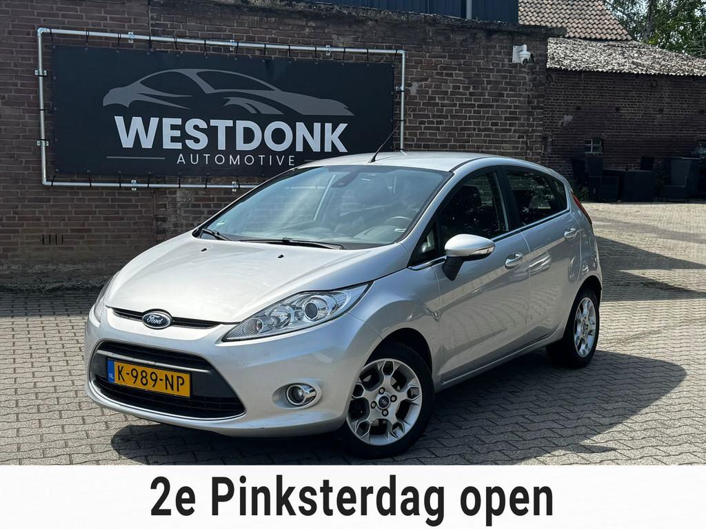 Ford Fiesta 1.25 Titanium 5drs - Airco/Climate/Stoelverwarmi, Auto's, Voorwielaandrijving, Euro 5, 1242 cc, 82 pk