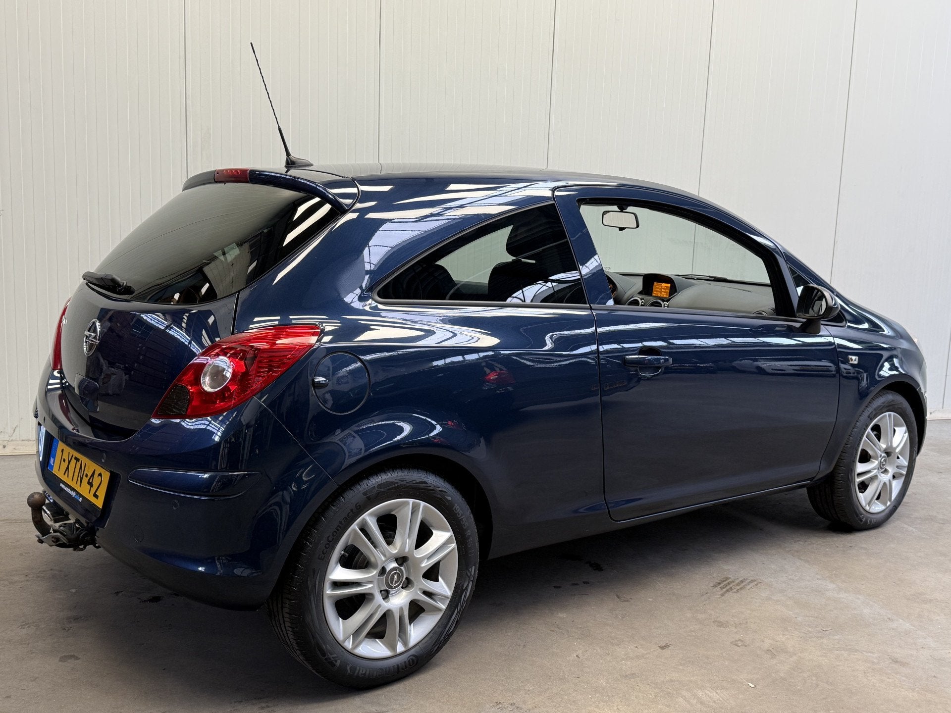Opel Corsa 1.2-16V BlitZ NAVIGATIE-AIRCO-TREKHAAK-LMV-PDC, Auto's, Voorwielaandrijving, 4 cilinders, Met garantie (alle), Blauw