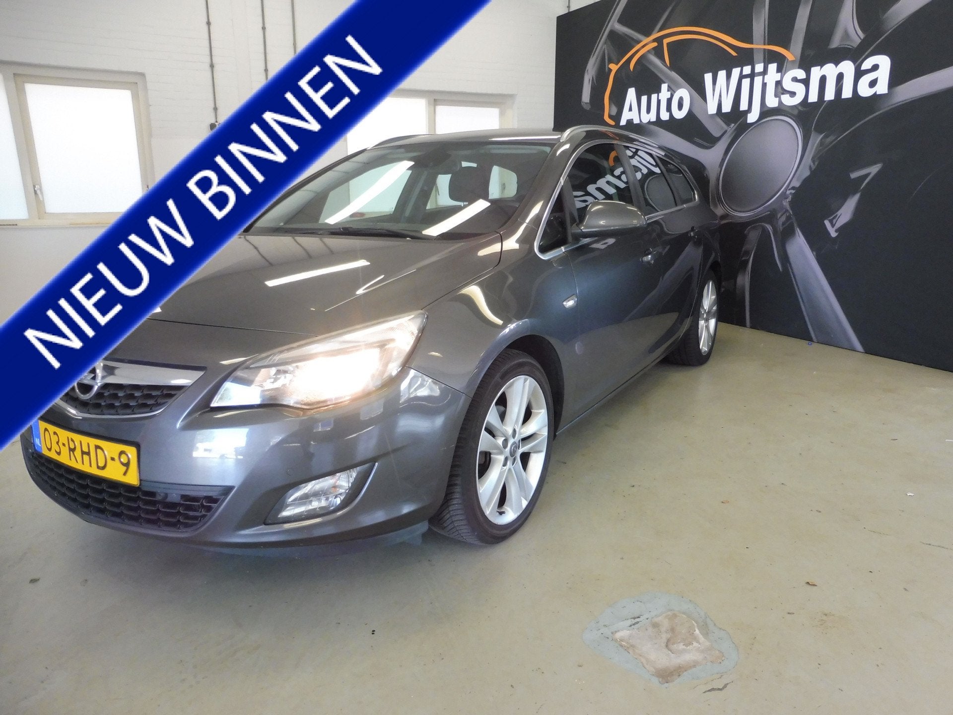 Opel Astra Sports Tourer 1.4 Turbo Sport Trekhaak | Cruise |, Voorwielaandrijving, Euro 5, Stof, Gebruikt