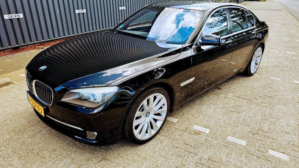 BMW 7-Serie 3.0 I 740 AUT 2009 Zwart, Auto's, Automaat, Achterwielaandrijving, Beige, 4 stoelen