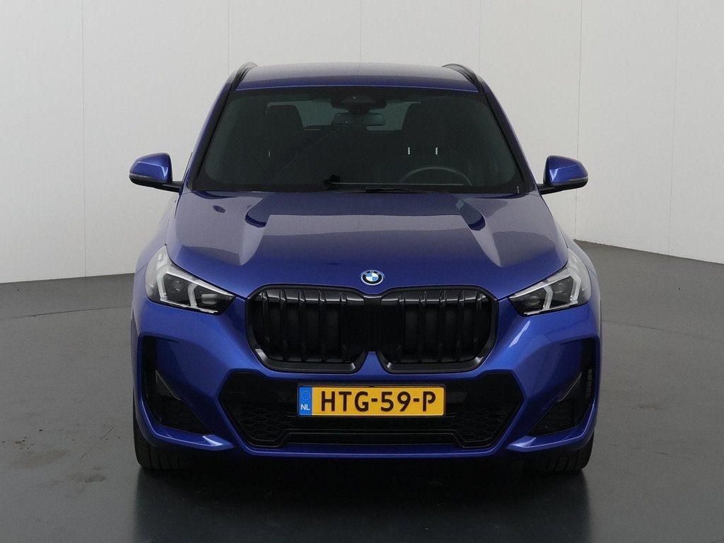 BMW X1 xDrive25e | M-Pakket | Curved Display | Sportstoelen, Auto's, BMW, Gebruikt, Euro 6, 16 kWh, Blauw