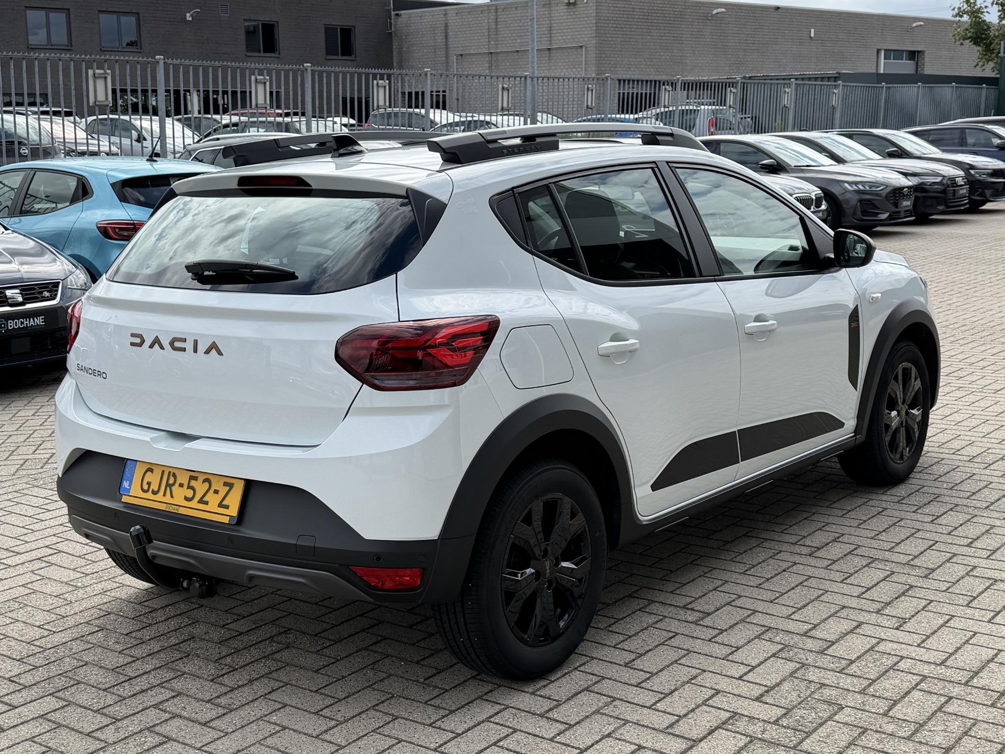 Dacia Sandero Stepway 1.0 TCe 100 ECO-G Extreme | Trekhaak |, Auto's, Dacia, Gebruikt, Met garantie (alle), 610 kg, Wit