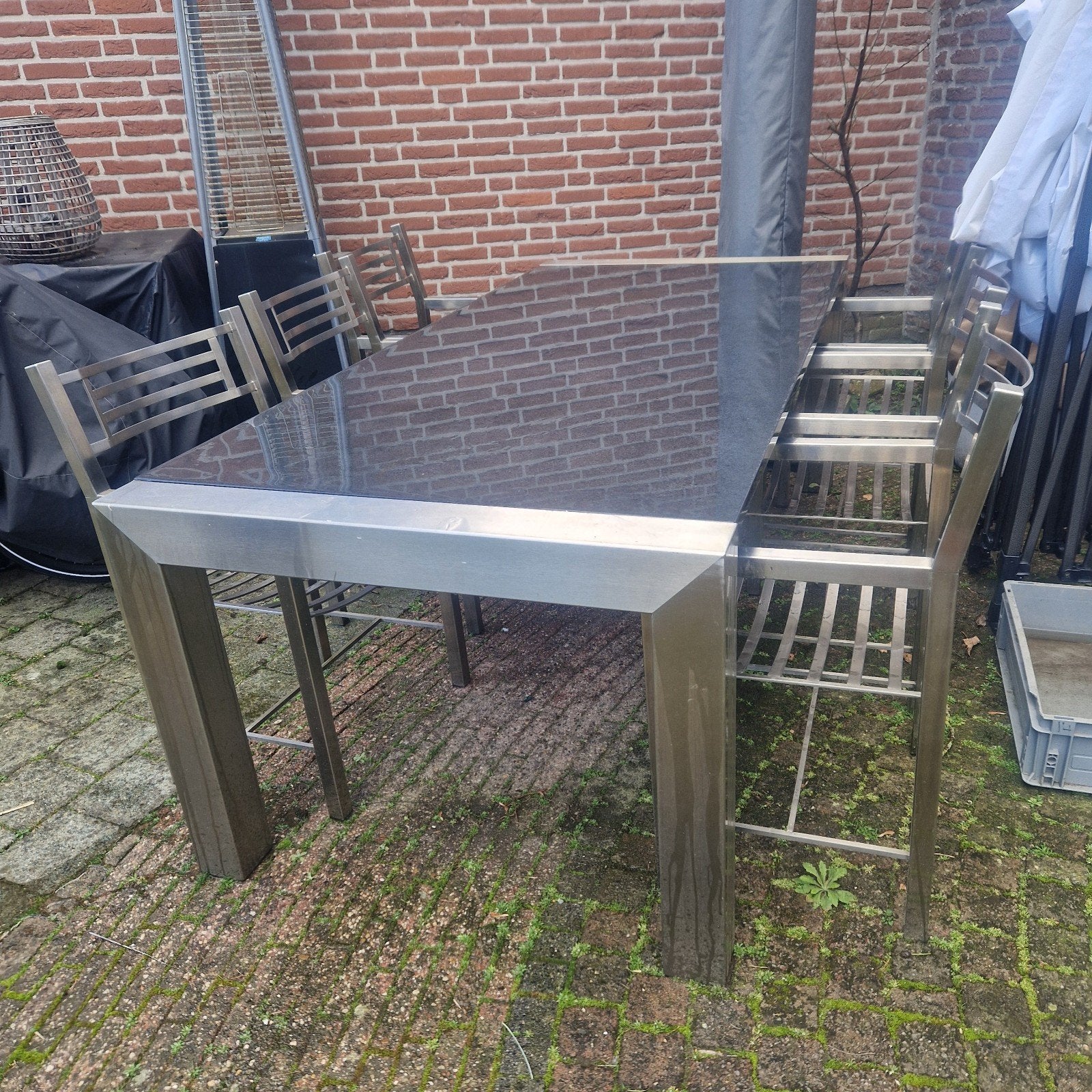 RVS tuintafelset met natuursteen blad en 6 stoelen, 6 zitplaatsen, Ophalen of Verzenden, Zo goed als nieuw, Rvs