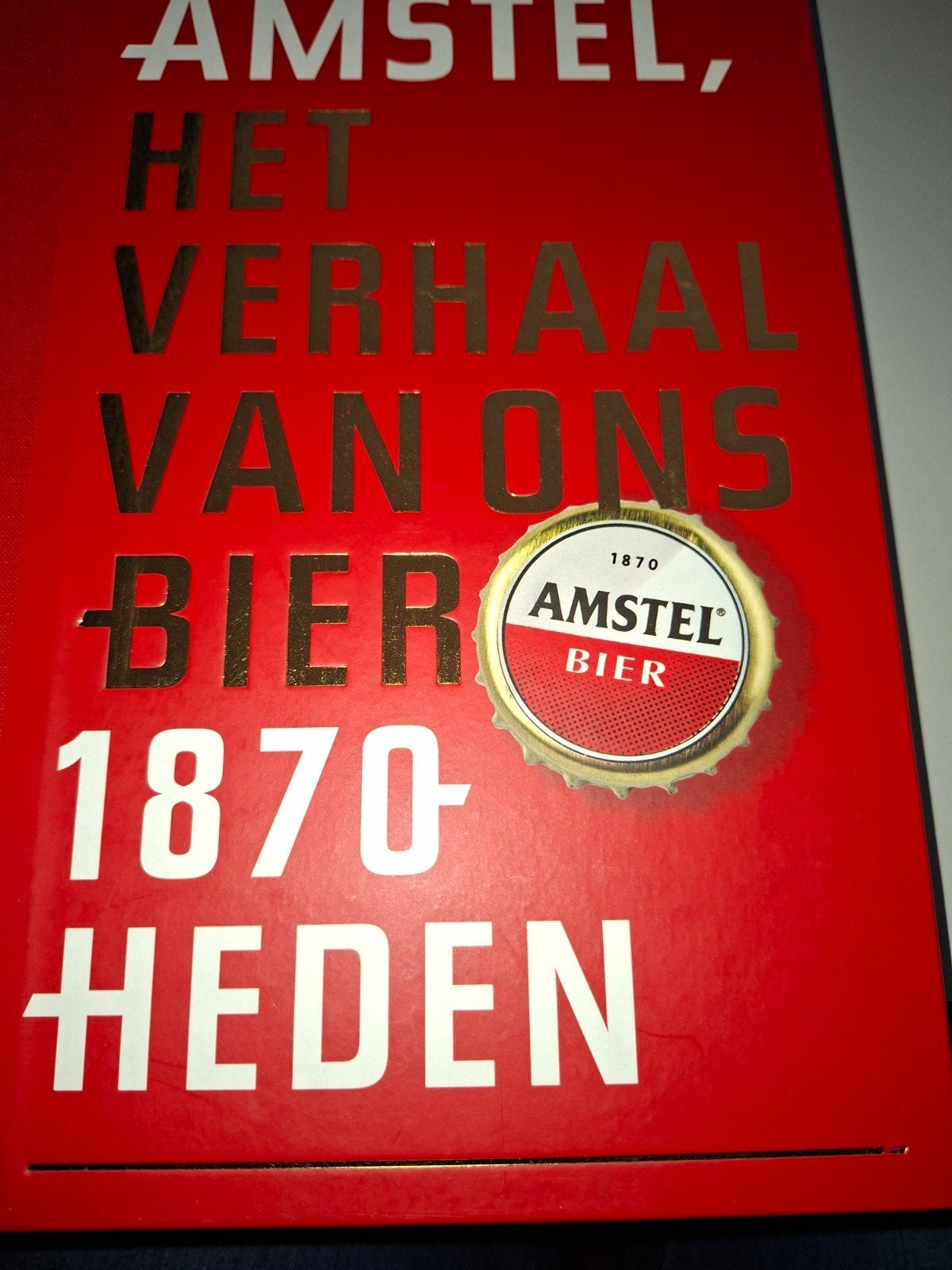 Amstel, het verhaal van ons bier 1870-heden, Verzamelen, Biermerken, Ophalen of Verzenden, Nieuw, Overige typen, Amstel