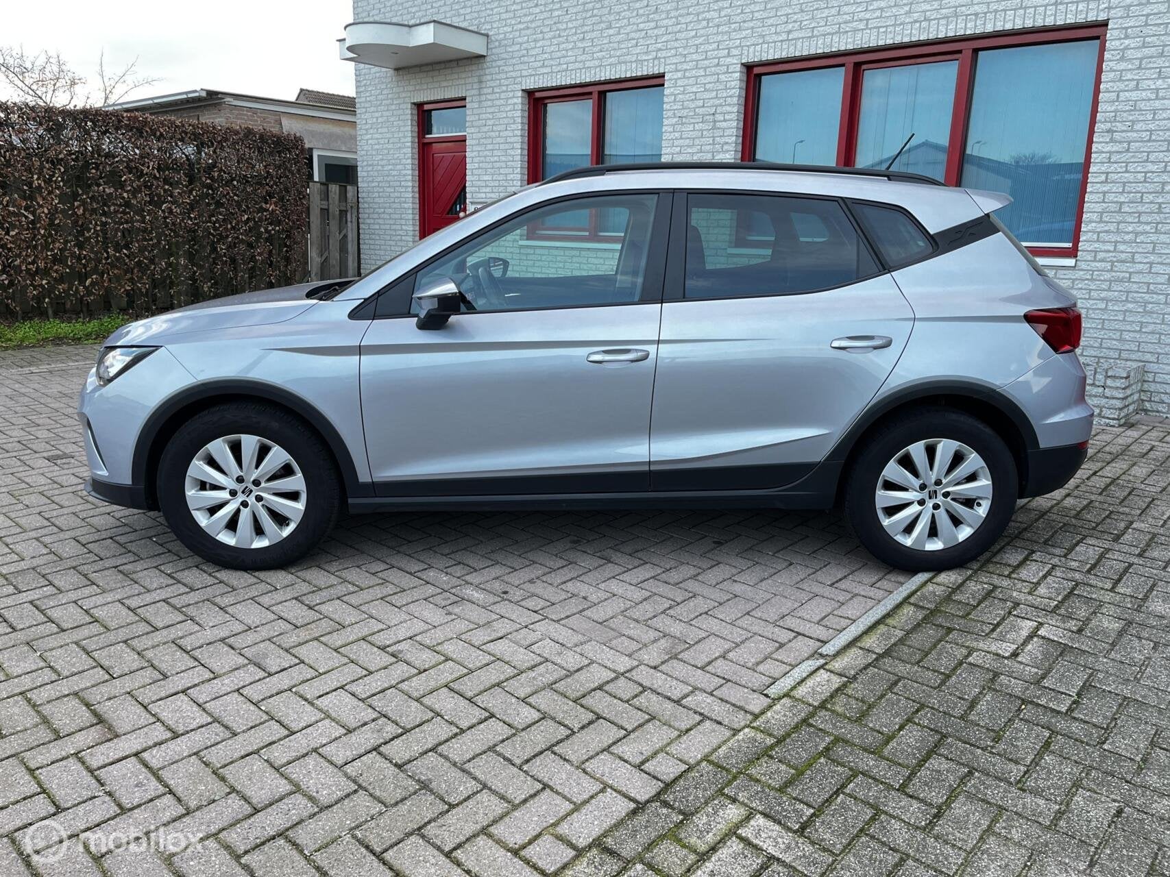 Seat Arona 1.0 TSI AUTOMAAT/NAVI/CRUISE/PDC, Auto's, Stof, Gebruikt, Parkeersensor, Bedrijf