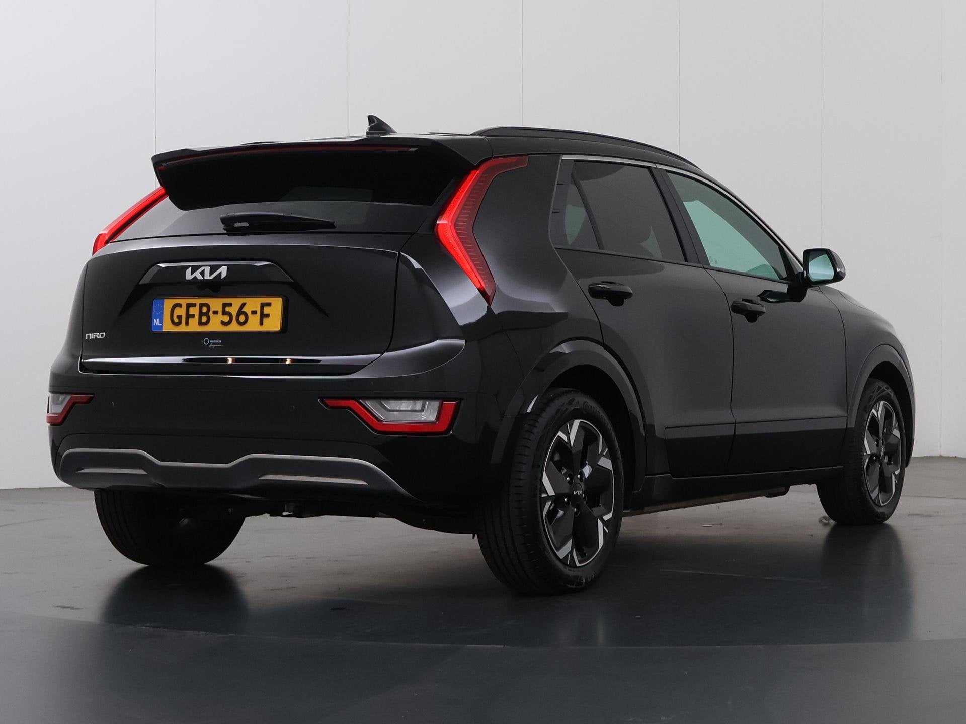 Kia Niro EV Plus 64.8 kWh | Schuif/Kanteldak | Leder | Adapt, Auto's, Gebruikt, 750 kg, 1657 kg, Zwart
