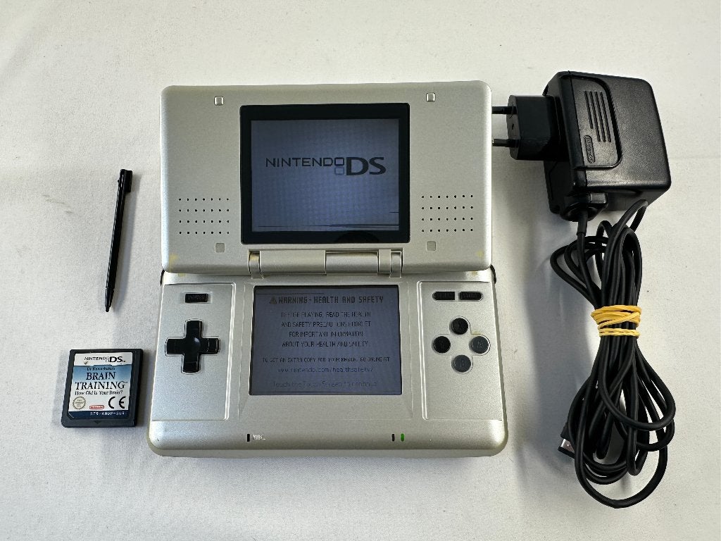Nintendo DS original phat grijs + oplader - Gebruikte staat, Nintendo, Ophalen of Verzenden, Onbekend, Zilver