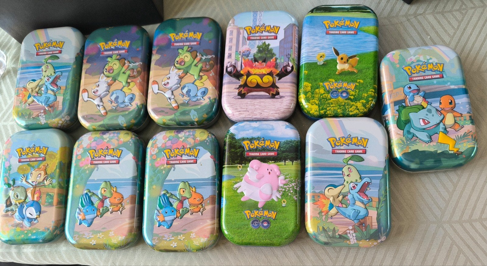 Pokémon Verrassing Minitins - 75 Kaarten per Tin Prijs p/st, Ophalen of Verzenden, Zo goed als nieuw, Meerdere kaarten