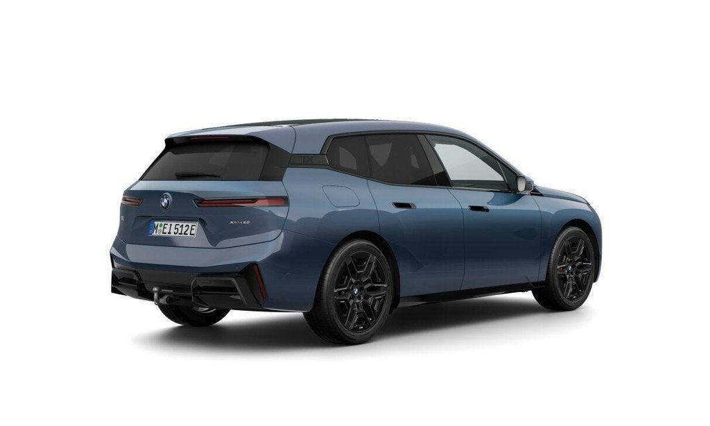 BMW iX xDrive60 | M Sportpakket Pro | Comfort Pack | Innovat, Auto's, BMW, Automaat, Stof, Blauw, 2480 kg