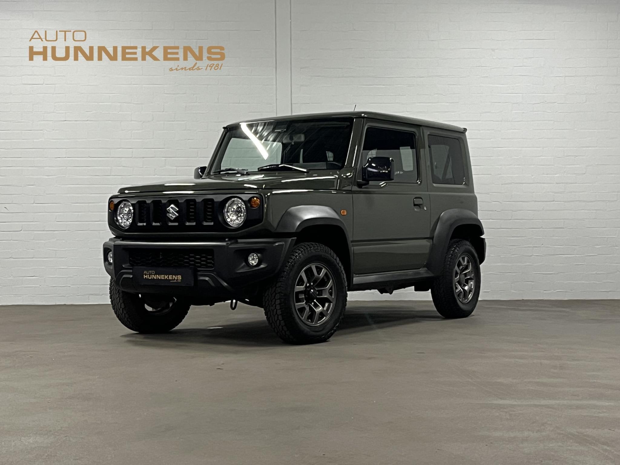 Suzuki Jimny 1.5 Stijl *4 persoons* Trekhaak | Cruise-/ clim, Auto's, Suzuki, 12 maanden, Gebruikt, Euro 6, 4 cilinders