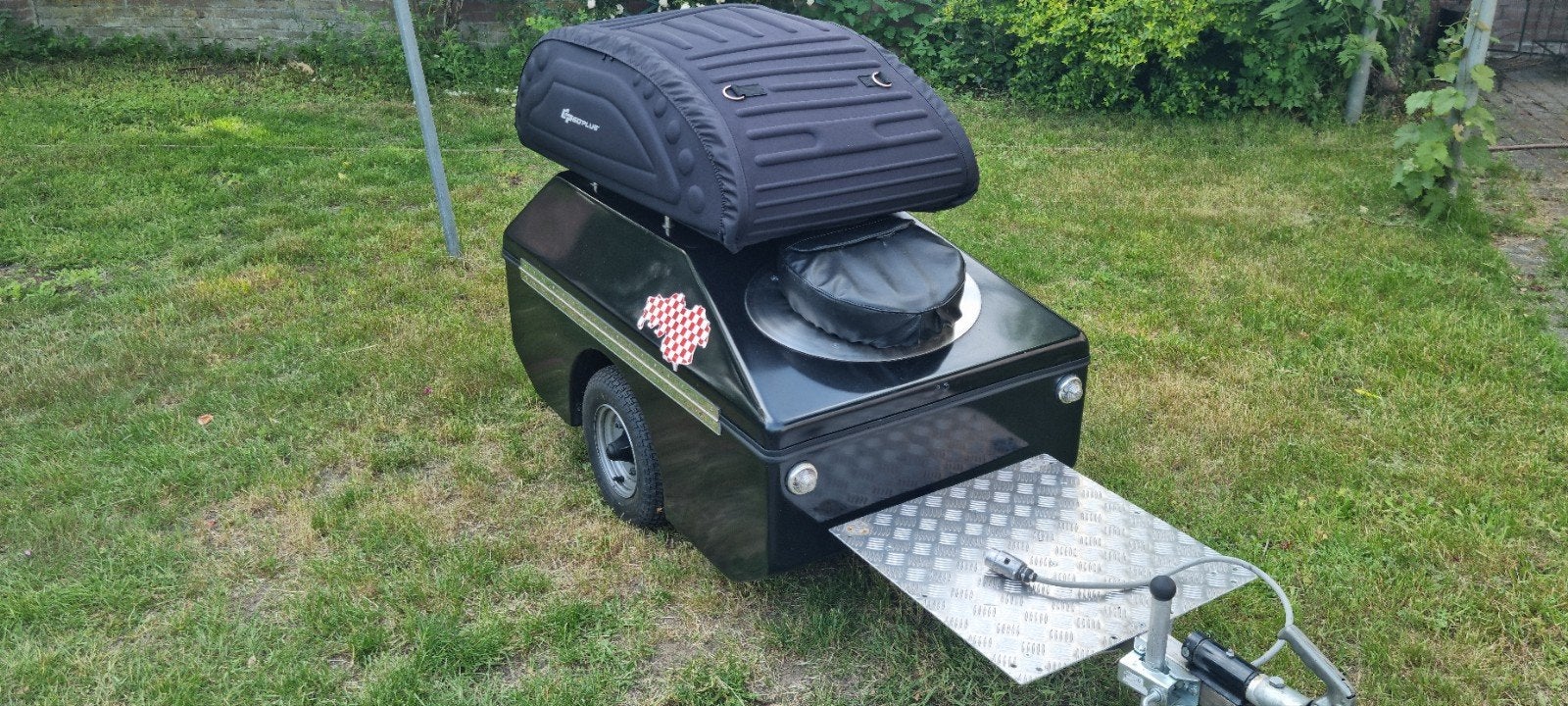 Aanhanger achter motor, Ophalen