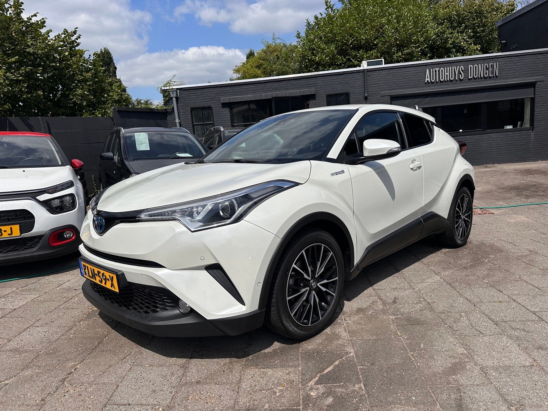 Toyota C-HR 1.8 Hybrid Black Edition|Leder|Navi, Auto's, Dealer onderhouden, Gebruikt, Zwart, 4 cilinders